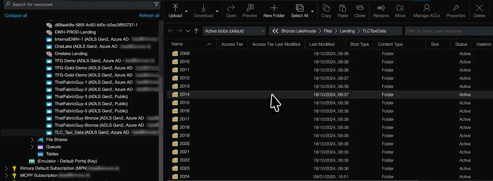 Azure Storage Explorer connected to the TLCTaxiData folder in the Bronze lakehouse, listing year folders from 2009 to 2024