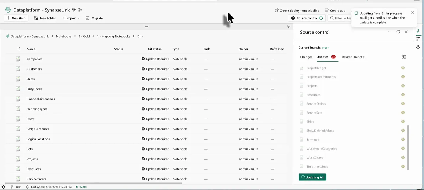 Fabric workspace with the Dim mapping notebooks on Update Required and the Source control pane showing 26 updates while Updating All runs